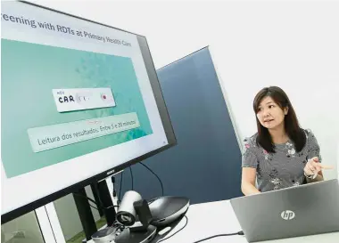  ??  ?? The cure: FIND HCV country project manager Sem XiaoHui showing the rapid diagnostic test kit for Hepatitis C at the Drugs for Neglected Diseases initiative office in Brickfield­s, Kuala Lumpur.