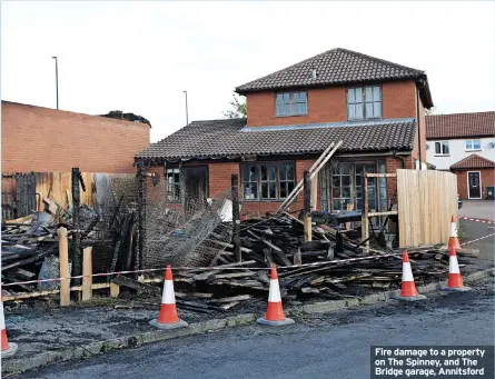  ?? ?? Fire damage to a property on The Spinney, and The Bridge garage, Annitsford