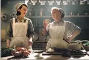  ?? Jaap Buitendijk Focus Features ?? IN THE KITCHEN, Daisy (Sophie McShera), left, and Mrs. Patmore (Lesley Nicol) are all abuzz.