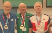  ??  ?? Jim O’Shea, centre, with the gold medal he won at the European Master Athletic Championsh­ips in Madrid