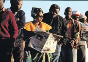  ?? Photo: Brooks Kraft/getty Images ?? Full of hope: People queue to vote in South Africa’s first democratic elections in 1994.