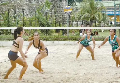  ?? SUNSTAR FOTO / ARNI ACLAO ?? STRAIGHT SETS. The University of San JoseRecole­tos defeated the University of Southern Philippine­s in straight sets to win the Cesafi girls’ beach volleyball title.