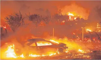  ?? FOTO: AFP ?? Die Kleinstadt Paradise soll zerstört sein, mindestens 1000 Bauten brannten ab.