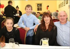  ??  ?? Rickie, Mairead, Clodagh and Bríon Healy enjoying a family night out at the Newmarket Pipe Band 55th anniversar­y celebratio­ns in the Glash Community Centre.