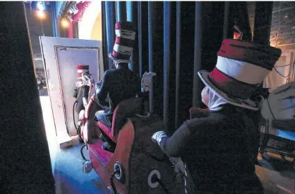  ?? William Luther / San Antonio Express-News ?? Actors prepare to go on stage for the Magik Theatre’s “The Cat in the Hat.”