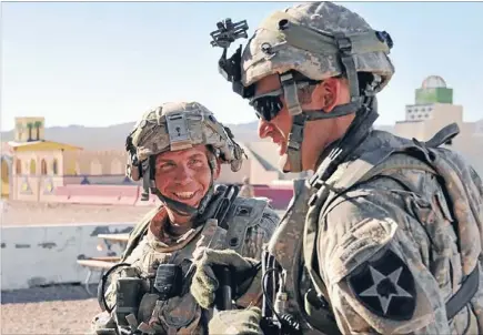  ?? Photos: REUTERS ?? Highly experience­d: Staff Sergeant Robert Bales, left, who has been identified as the US soldier accused of last week’s killings of 16 Afghan civilians in Panjwai, Kandahar. He is seen during an exercise at the National Training Centre in Fort Irwin,...