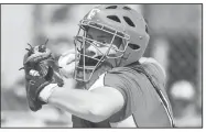  ?? NWA Democrat-Gazette/CHARLIE KAIJO ?? Alyssa Reed of Farmington prepares to throw during a game with Gentry earlier this season. Reed is a four-year starter at catcher and the leading hitter for the Lady Cardinals, who will host the 4A-North Regional Tournament at Farmington.