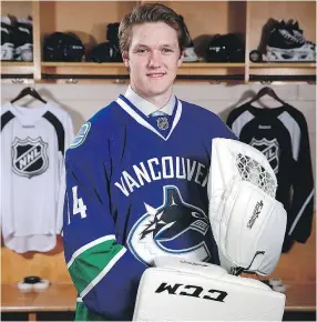  ?? — GETTY IMAGES FILES ?? Utica Comets coach Travis Green is anxious to see Canucks goaltendin­g prospect Thatcher Demko, above, in action at the Young Stars tourney this weekend in Penticton.