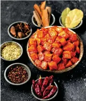  ??  ?? The spicy, tongueting­ling Sichuan Mala Salmon is an all-time favourite seasonal special.