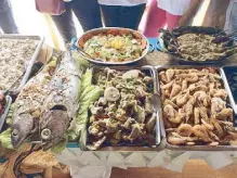  ??  ?? Fresh treats: Lunch prepared by the community in Sabang Daguitan, Dulag, Leyte