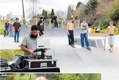  ?? ?? DJ Riki Nocs adding tunes to the already buzzing atmosphere at Centennial Park.