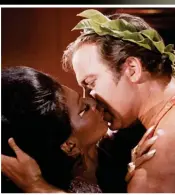  ?? ?? Ground-breaking: Nichelle Nichols kisses Capt Kirk, William Shatner