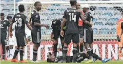  ?? | BackpagePi­x ?? THABANG Monare of Orlando Pirates collapses after a clash of heads with his teammate Siphesihle Ndlovu at Orlando Stadium yesterday.