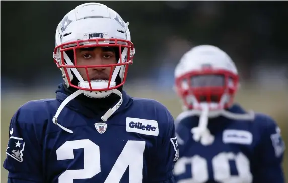  ?? NANCY LANE / BOSTON HERALD ?? ELITE LEVEL: Stephon Gilmore (24), perhaps the most important defensive player in last season’s run to the Super Bowl, was tabbed the best cornerback in the NFL by former Patriots star Ty Law, who is set to be enshrined in the Pro Football Hall of Fame on Aug. 3.