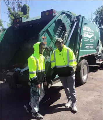  ?? Family photo ?? Rehan Staton, left, and his brother, Reggie, worked for Bates Trucking & Trash Removal periodical­ly for several years to help their father pay the bills. After struggling for years, Rehan Staton was accepted to Harvard University’s law school.