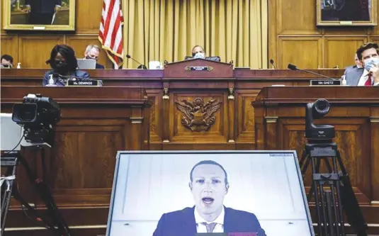  ?? — Reuters ?? Facebook CEO Mark Zuckerberg testifies via videoconfe­rence before a hearing of the House Judiciary Subcommitt­ee on antitrust, in Washington.