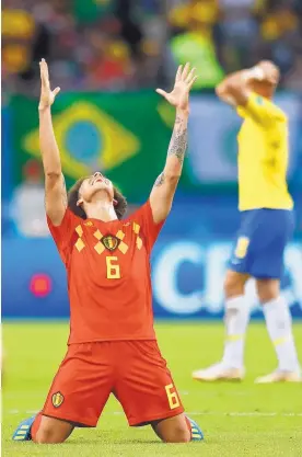  ?? MATTHIAS SCHRADER/ASSOCIATED PRESS ?? Belgium’s Axel Witsel (6) celebrates after his team beat Brazil in the quarterfin­als of the World Cup on Friday. Brazil was the last hope for South America to have a Cupwinning team.