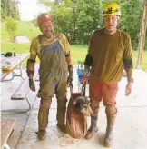  ?? RICK HALEY ?? Gerry Keene (left) and Rick Haley with Abby after they rescued her from a Missouri cave Aug. 6.