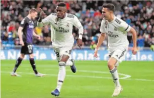  ?? EFE ?? Vinicius celebra su gol al Leganés, perseguido por Reguilón