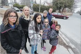  ?? CLIFFORD SKARSTEDT/EXAMINER ?? Highland Heights Public School principal Drew Beaton along with staff and students are lobbying for a crosswalk or even traffic signals at Fairbairn Street and Highland Road.