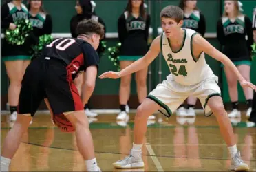  ?? PILOT PHOTO/BEV HARAMIA ?? Bremen’s Seth Libey (24) applies defensive pressure during the Lions’ game with Oregon-davis. The Bremen ‘D’ will get tested with three ranked teams in its sectional.