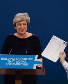  ?? Photograph: Peter Byrne/PA Wire ?? Prime Minister Theresa May fell victim to a prankster during her keynote speech to the Tory Party conference