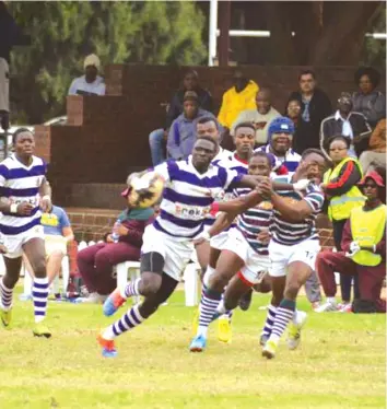  ??  ?? Bulldozer. . . Churchill Bulldogs lock Akim Dick shruggs off a challenge from a Prince Edward Tigers opponent during a clash recently