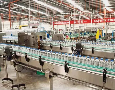  ??  ?? Raising capital : Spritzer’s bottling plant in Taiping. Via its private placement, Spritzer will be raising a total fund worth about RM63.81mil at an issue price of RM2.33 apiece.