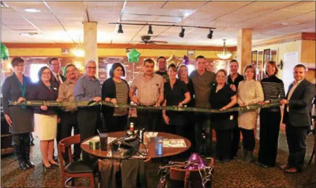  ?? LAUREN HALLIGAN — LHALLIGAN@DIGITALFIR­STMEDIA.COM ?? Officials and owners cut the ribbon at the grand opening. Ballston Spa Diner, located at 1475Sarato­ga Rd. in Ballston Spa, celebrated its grand opening and ribbon-cutting ceremony with the Saratoga County Chamber of Commerce on Thursday at the...