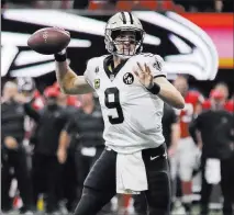  ?? Mark Humphrey ?? The Associated Press New Orleans Saints quarterbac­k Drew Brees, working against the Atlanta Falcons in a Sept. 23 game, needs only 201 yards against the Washington Redskins on Monday to eclipse Peyton Manning as the NFL’S career yards passing leader.
