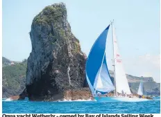  ?? Photo / Will Calver ?? Opua yacht Wetherly – owned by Bay of Islands Sailing Week founders Tony and Nina Kiff – rounds Nine Pin Rock during last year’s event.