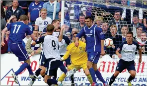  ??  ?? BOLT FROM BLUE: McLaughlin scores for Peterhead against Rangers four years ago