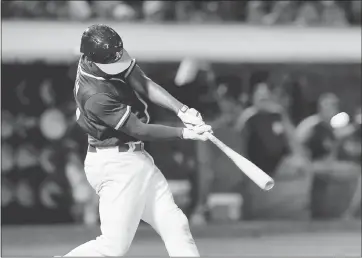  ?? JANE TYSKA – STAFF PHOTOGRAPH­ER ?? The Athletics’ Marcus Semien hits a grand slam off Giants reliever George Kontos in the sixth inning on Monday night.