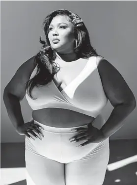  ?? BETHANY MOLLENKOF/THE NEW YORK TIMES ?? Grammy-winning singer Lizzo, seen March 22 in Los Angeles, is releasing a line of shapewear.