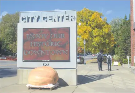  ?? LAUREN HALLIGAN - MEDIANEWS GROUP ?? A 1273-pound pumpkin grown by Wayne Seelow of Edinburg is displayed at the Saratoga Spring City Center on Broadway in downtown Saratoga Springs as part of the 2020 Saratoga Giant Pumpkinfes­t.