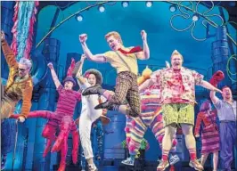  ?? Joan Marcus Boneau / Bryan-Brown ?? ETHAN SLATER, center, has made a splash on Broadway in “SpongeBob.”