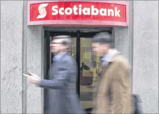  ?? CP PHOTO ?? A branch of Scotiabank is pictured in downtown Toronto last month.