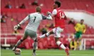  ?? Photograph: Mike Egerton/Reuters ?? Tim Krul sees his clearance blocked by Aubameyang for Arsenal’s first goal.