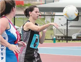  ?? ?? Above: Cora Lynn’s Natalie Hatigan takes a centre pass against Bunyip on Saturday.
West Gippsland photograph­s by AMANDA EMARY.