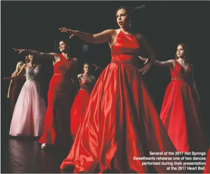  ??  ?? Several of the 2017 Hot Springs Sweetheart­s rehearse one of two dances performed during their presentati­on at the 2017 Heart Ball.