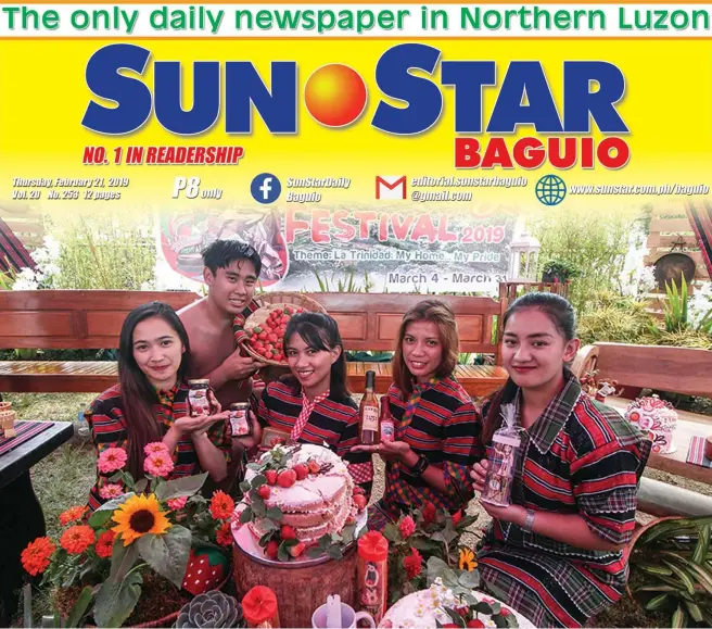  ?? Photo by Jean Nicole Cortes ?? LA TRINIDAD’s BEST. Youth garbed in their ethnic attire showcase strawberri­es and locally made products of La Trinidad as the town celebrates its annual Strawberry Festival starting March 4- 31 with the theme “La Trinidad: My home .. My Pride.”