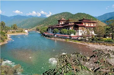  ??  ?? Bhutan’s ‘‘high value, low impact’’ tourism model ensures your visit benefits local communitie­s.