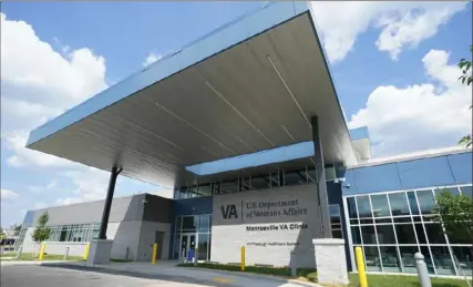  ?? Sebastian Foltz/Post-Gazette ?? The new Monroevill­e VA Clinic by Monroevill­e Mall. The clinic was to open July 31. When fully operationa­l the 72,000 square-foot facility will serve an estimated 4,000 veterans, at a rate of up to 400 patients per day. Lawmakers from Western Pennsylvan­ia want to name it for a Black veteran of the D-Day invasion.