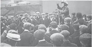  ??  ?? “Can your readers identify who is speaking and where this picture was taken?” asks Jim Howie. “The postcard came from the Montrose area and railway wagons can be seen beyond the gates. The meeting may relate to a political, suffragett­e or temperance gathering in the period 1905–1912.”