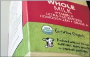  ?? STEVEN SENNE — THE ASSOCIATED PRESS ?? Regulators and organic food companies say they’re addressing challenges posed by the industry’s growth and complexity.