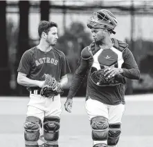  ?? Karen Warren / Staff photograph­er ?? Garrett Stubbs, left, and Martin Maldonado comprise two-thirds of the Astros’ big-league ready catching options.