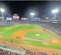  ?? STUART CAHILL / BOSTON HERALD ?? ‘NOT AFFORDABLE’: The Red Sox, shown during Game 1 at Fenway Park, will make another World Series appearance. Grabbing tickets to a Series game will cost at least $500, according to some price predictors.