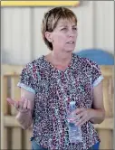  ??  ?? MARY WORTHEN, WITH the Yuma Jaycees, talks about the donation of land to Old Souls animal rescue.