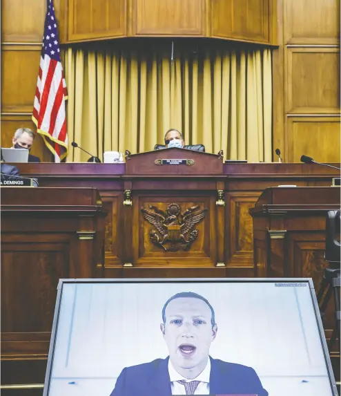  ?? GRAEME JENNINGS / POOL VIA REUTERS FILES ?? Facebook CEO Mark Zuckerberg speaks via video conference at a July hearing of the House Judiciary Subcommitt­ee
on Antitrust. The subcommitt­ee’s report calls for tech companies like Facebook to be broken up and reined in.