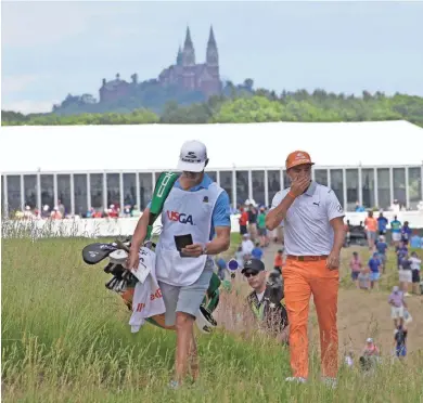  ?? MIKE DE SISTI / MILWAUKEE JOURNAL SENTINEL ?? Rickie Fowler finished tied for fifth in the U.S. Open at Erin Hills. He has competed in 30 majors without a victory.